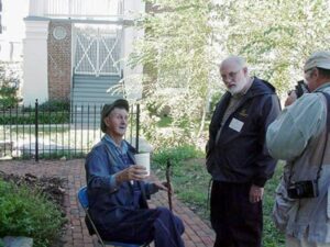 Ray holding court with Jimmy Neil Smith, founder of the National Storytelling Festival and Tom Raymond, storyteller photographer extraordinaire.