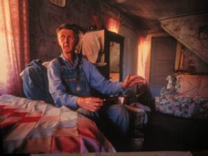 Ray said, "I live the stories", and he started in telling. "That wind, where they stayed at, that northwest wind, gah, hit would come through and just burn the house, like I've had it here, just burn the house." (Photo by: Tom Raymond)