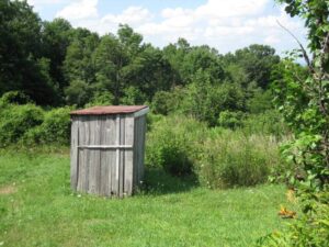 For almost 100 years, the Hicks family used this outhouse. Now Rosa says she's glad she doesn't have to walk out into the cold on a snowy night! (Photo by: Connie Regan-Blake)